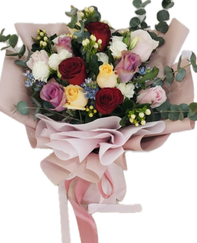Lovely one dozen mix roses with seasonal fillers in a bouquet | Online ...